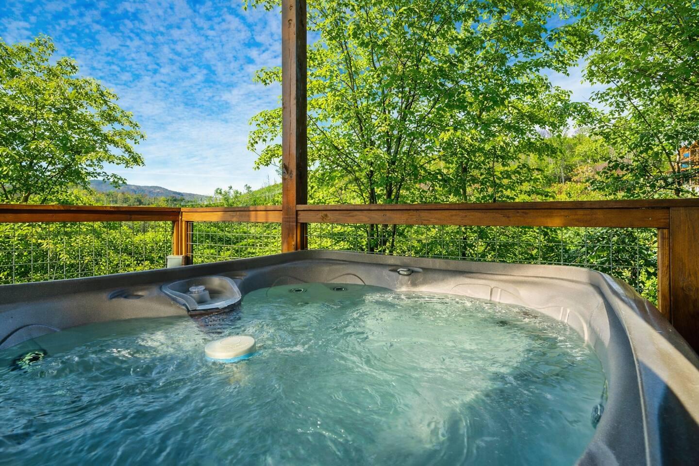 Hot tub with panoramic mountain views